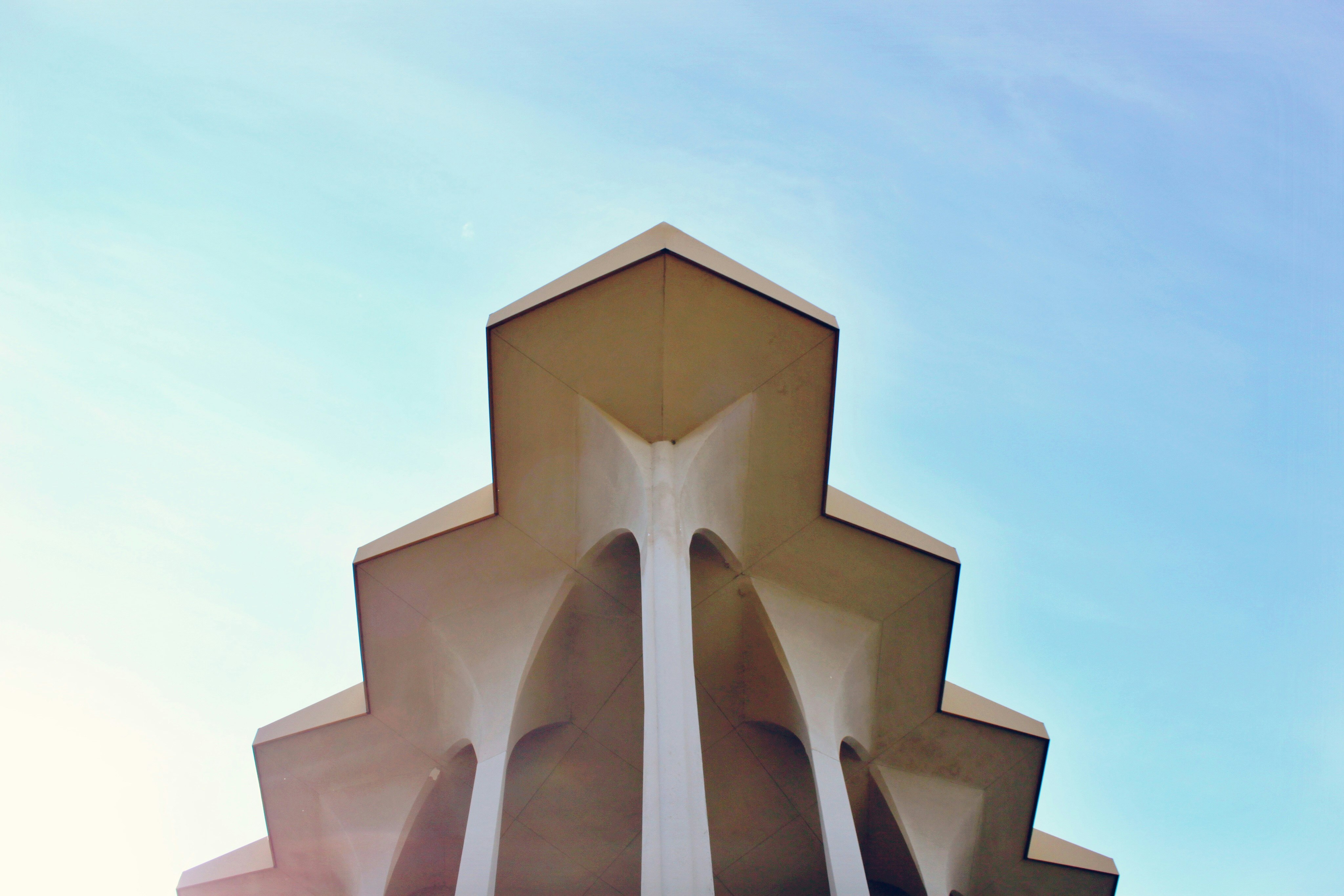 white and brown concrete building during daytime